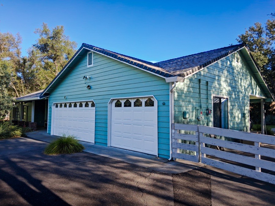 Teal house exterior painting completed by Husky Pro Painting, Shasta County CA